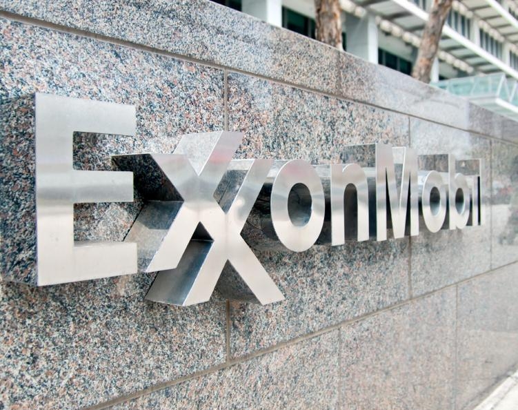 политика Exxon Mobil 