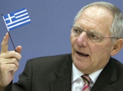 Вольфганг Шойбле с флагом Греции