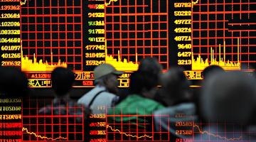 4. Мониторы Шанхайской фондовой биржи, показывающие индекс SSE