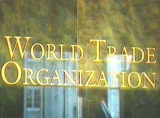 Логотип Всемирной Торговой Организации на входе