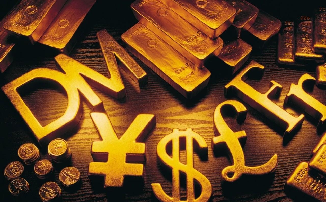 Символы мировых валют в золотом исполнении