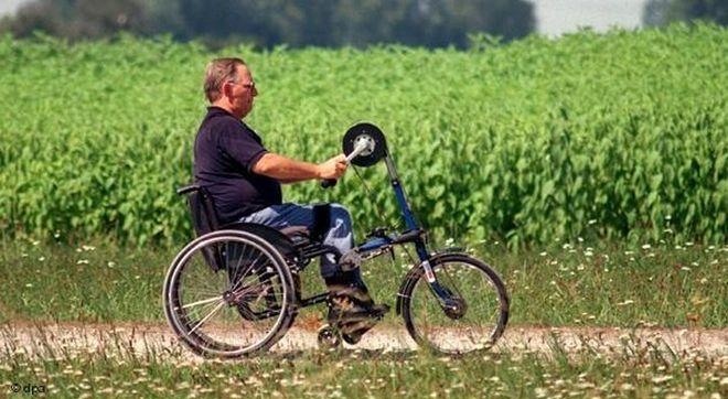 Вольфганг Шойбле в инвалидном кресле